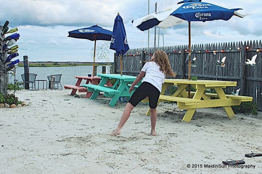 Playing in the sand at the Hide Away Grill.