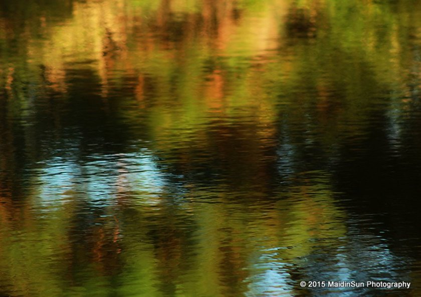 In the abstract. (Ripples and reflections on the surface of the lagoon near sunset.)